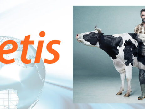 Logotipo Zoetis y ganadero con vaca frisona