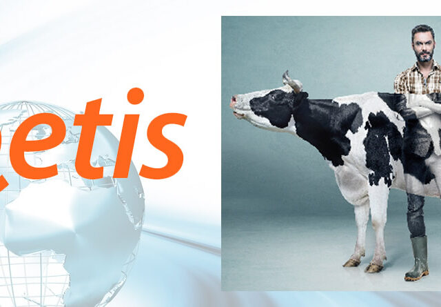 Logotipo Zoetis y ganadero con vaca frisona